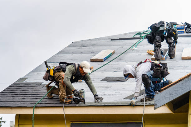 Professional Gutter Installation technician working in Whitewater, KS